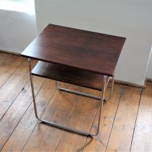 Functionalist table with storage space